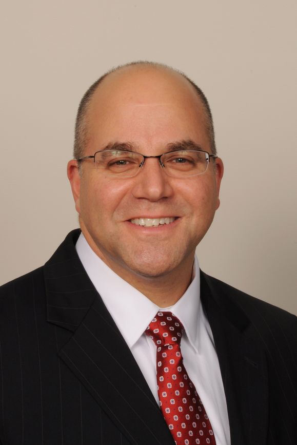 Daniel Blum wearing a red tie